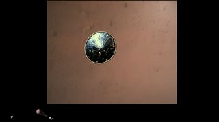 This still is from a video NASA released yesterday; the first video from its Perseverance rover, which landed in Jezero Crater on the Martian surface Feb. 18, 2021. Using cameras from the rover in addition to cameras on the supersonic parachute and "Skycrane" that helped to slow down and lower the craft to the Red Planet's surface, NASA was able to show us back on Earth what it was like for Perseverance to actually land on Mars.