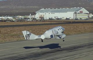 SpaceShipTwo lands back home on earth, following the first solo test glide test on Oct. 10, 2010.