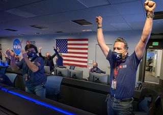 Members of NASA&rsquo;s Perseverance rover team react in mission control at NASA's Jet Propulsion Laboratory in Southern California on Feb. 18, 2021, after receiving confirmation that the spacecraft successfully touched down on Mars.