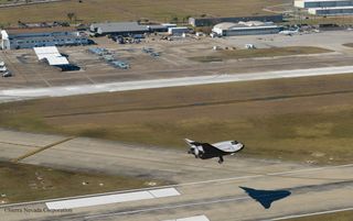Conceptual image of Sierra Nevada Corp.'s (SNC) Dream Chaser spacecraft landing on the runway at Houston's Ellington Field, which the Houston Airport System wants to turn into a spaceport.