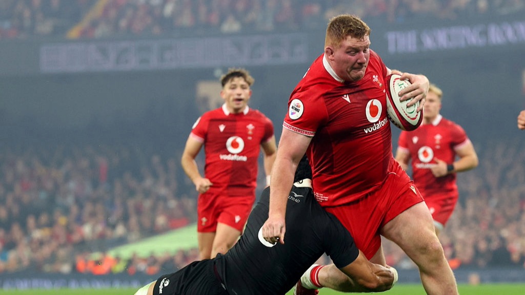 Rhys Carre of Wales attempts to run beyond New Zealand in their November rugby international.