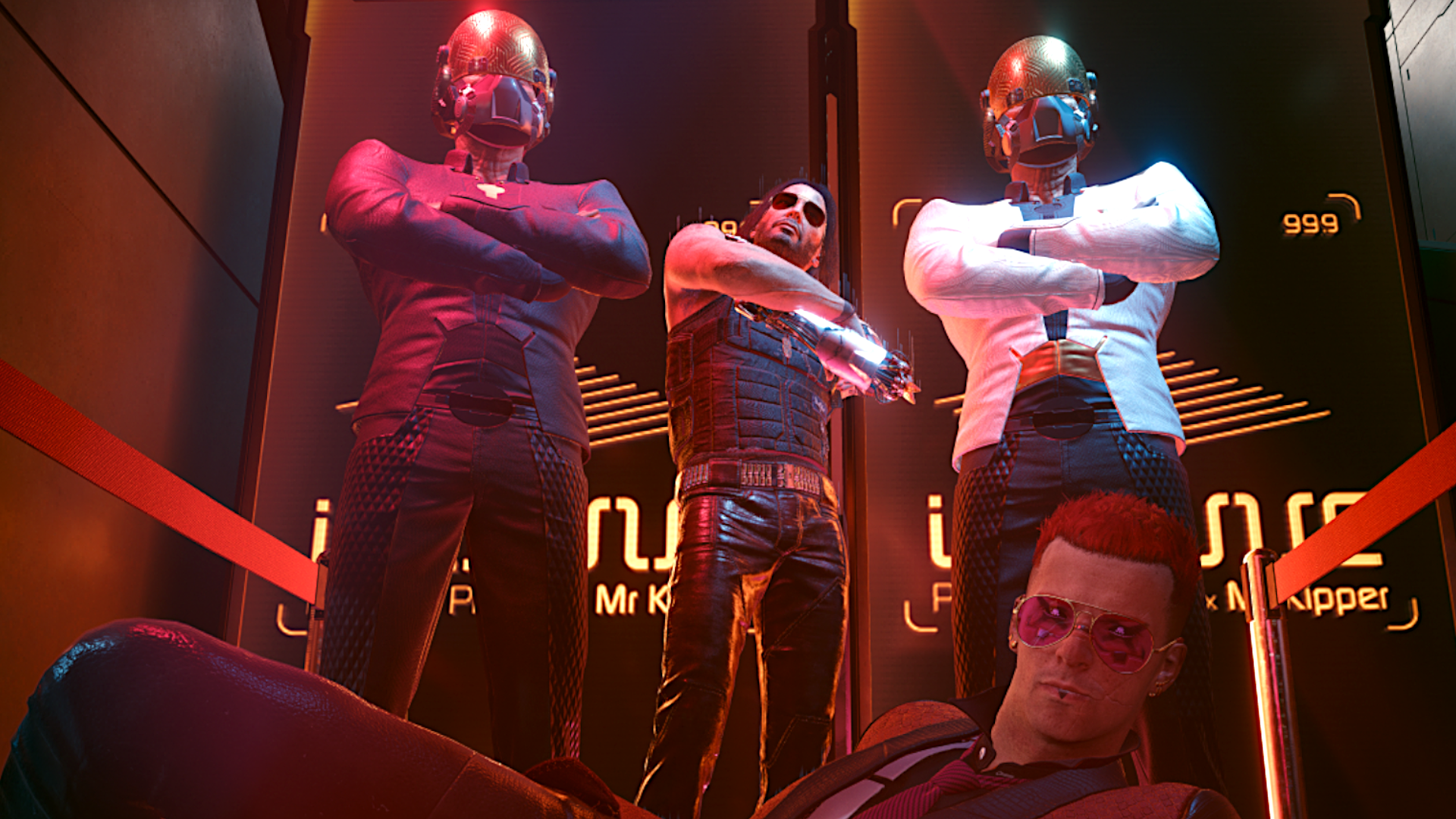 An image of V, the protagonist of Cyberpunk 2077, laying on the floor while punk rocker and anarchist Jhonny Silverhand poses with two behelmeted DJs resembling Daft Punk.