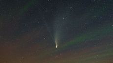A comet swoops across the sky