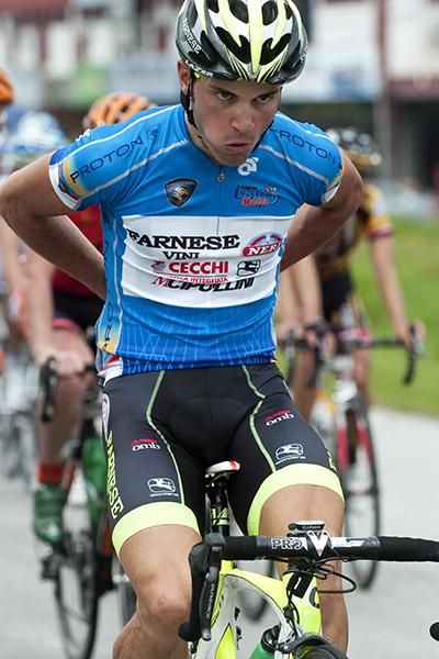 Sprint points leader and former tour leader, Andrea Guardini (Farnese Vini/Neri Sottoli) has a bite to eat after the peloton passed through a feeding station.