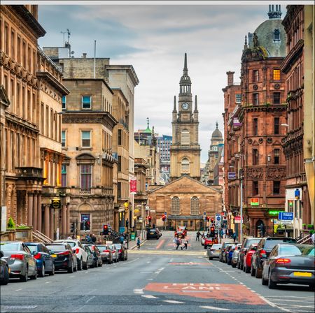 George Street with St George's Tron Church of Scotland in downtown Glasgow, Scotland.