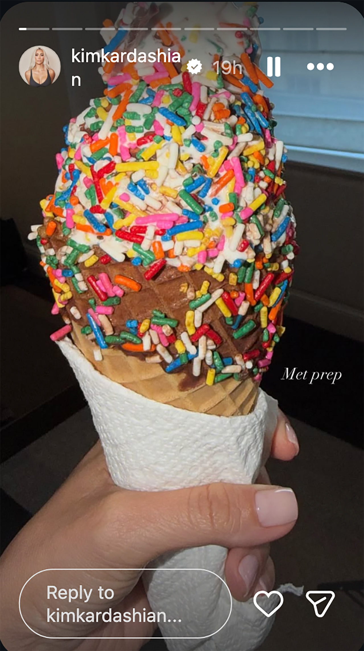 Kim Kardashian holding an ice cream cone that's covered in rainbow sprinkles. Her caption reads &amp;quot;Met prep.&amp;quot;
