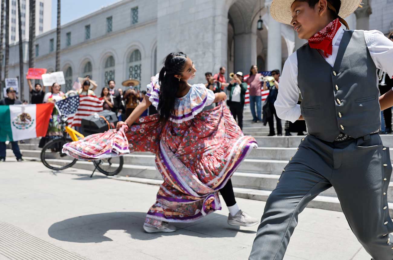 Images of protestors outside of the Los Angeles City Hall.