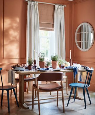Dining room with terracotta walls