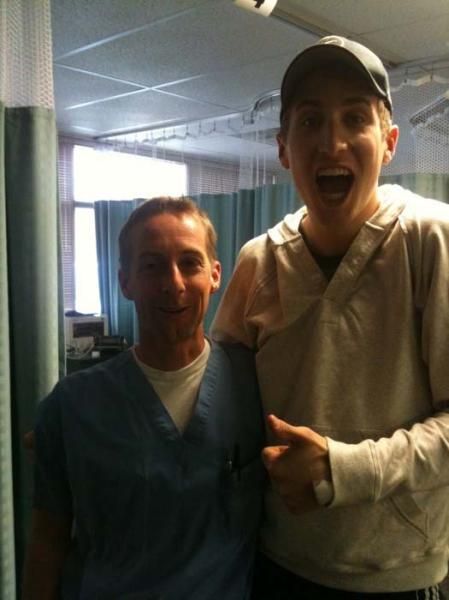 This is me and Doc Major after the surgery... I definitely do NOT remember taking this picture. I'm impressed that I was standing, it took a lot of anesthesia to get me down!