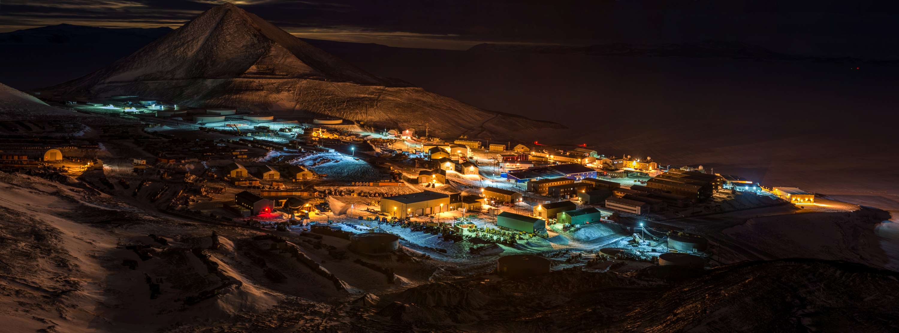 Lights illuminate McMurdo Station in Antarctica.