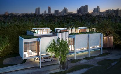 The Prairie Avenue residence, elevated from the ground on stilts. 