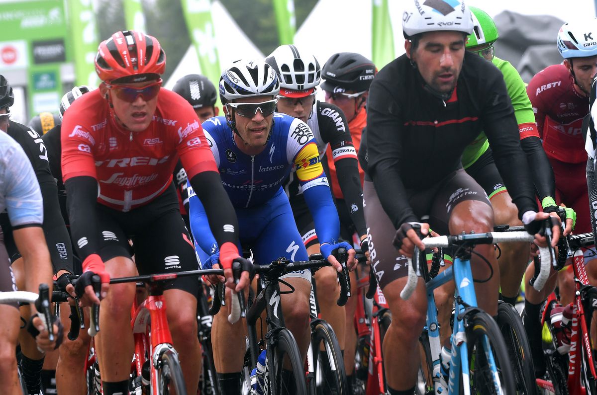 Danish champion Mads Pedersen was rugged up for the wet stage