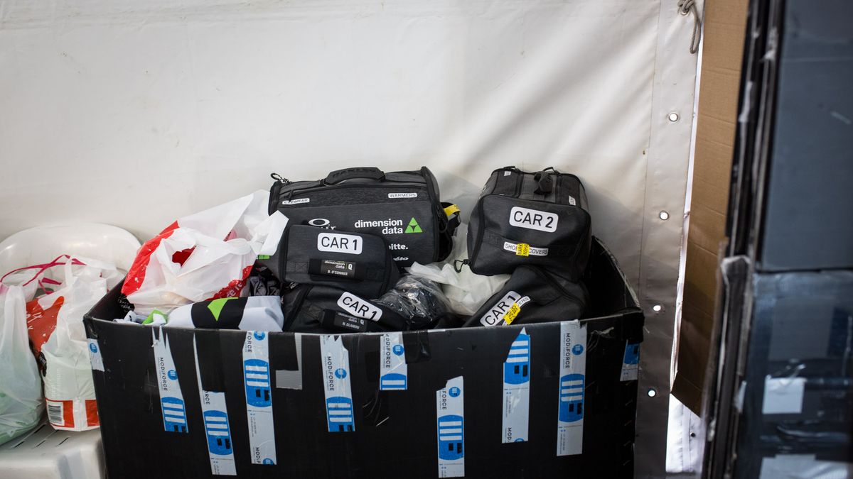 Dimension Data had kit bags laid out for the riders and labelled which cars they'd be going into