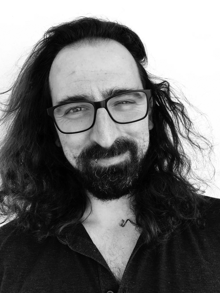 Black and white headshot photograph of Creative Bloq contributor João Sousa