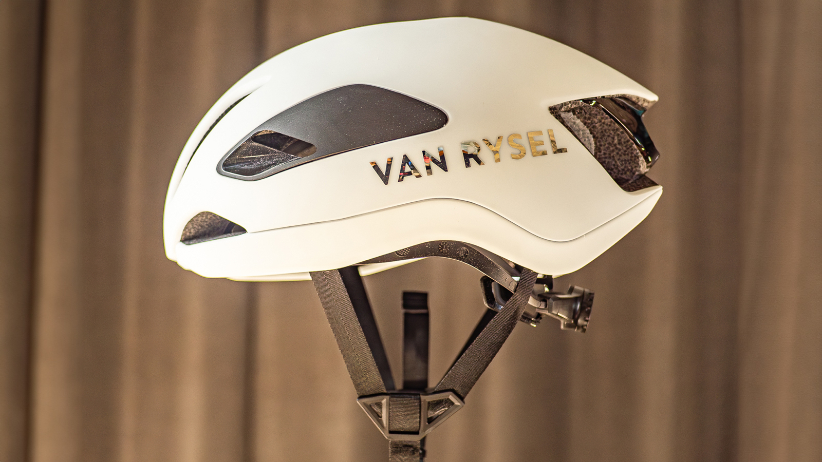 The Van Rysel FCR helmet on a plain background