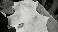 Frei Otto with the model for the roofing of the Olympic Park’s swimming hall, Munich, c. 1970