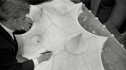 Frei Otto with the model for the roofing of the Olympic Park’s swimming hall, Munich, c. 1970