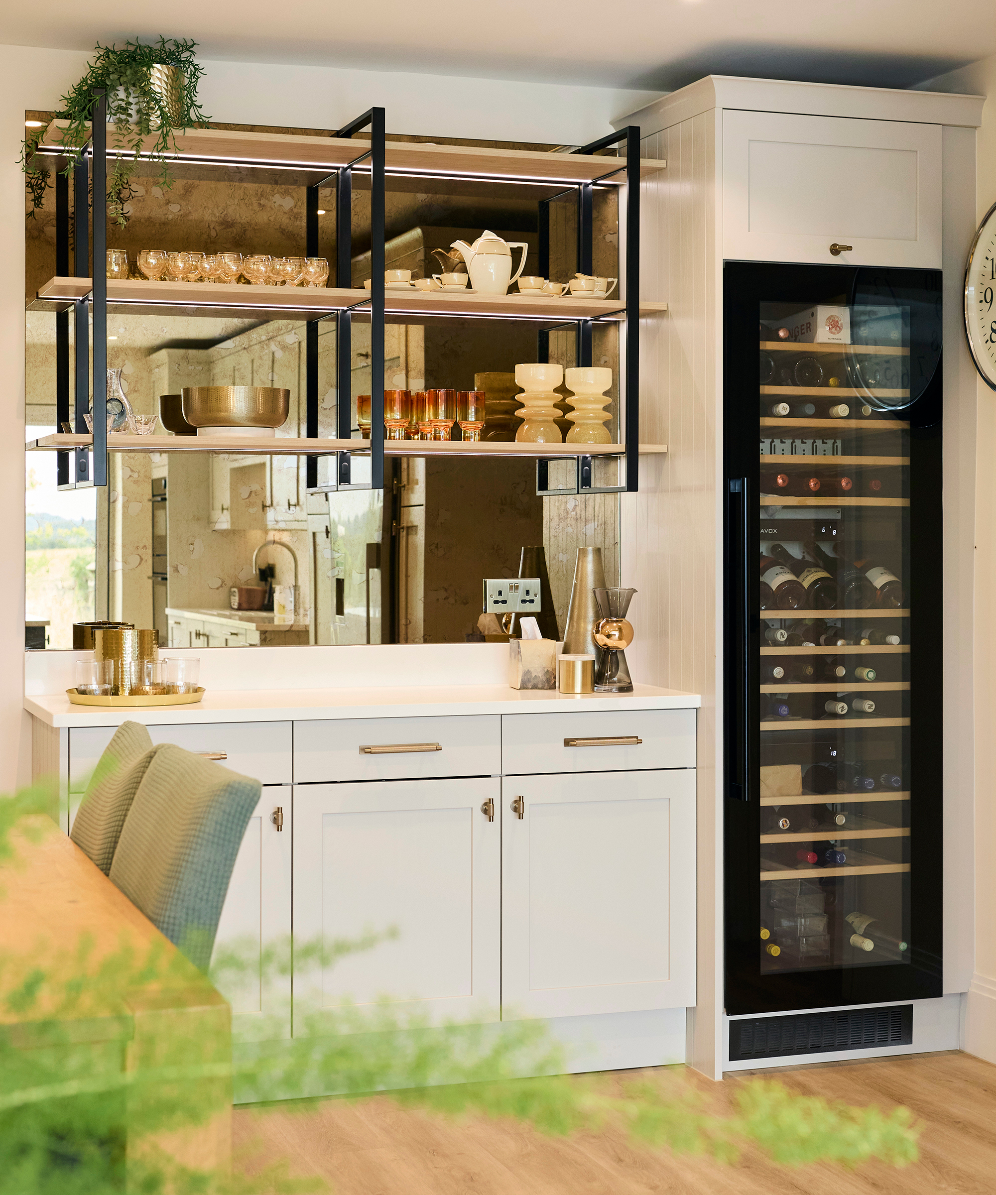 modern white and gold home bar with wine cooler
