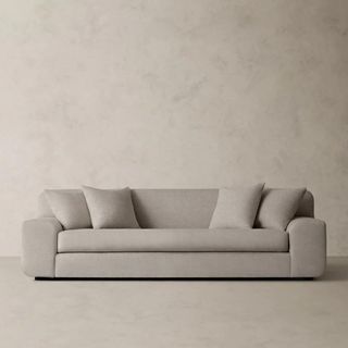 A gray couch from Banana Republic