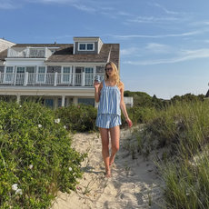 Lauren in a striped matching shorts set on the beach