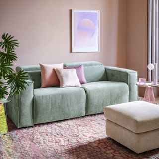 Sofology The Horizon in sage green in a pink living room