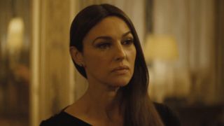 Monica Bellucci sternly stands in her bedroom in Spectre.