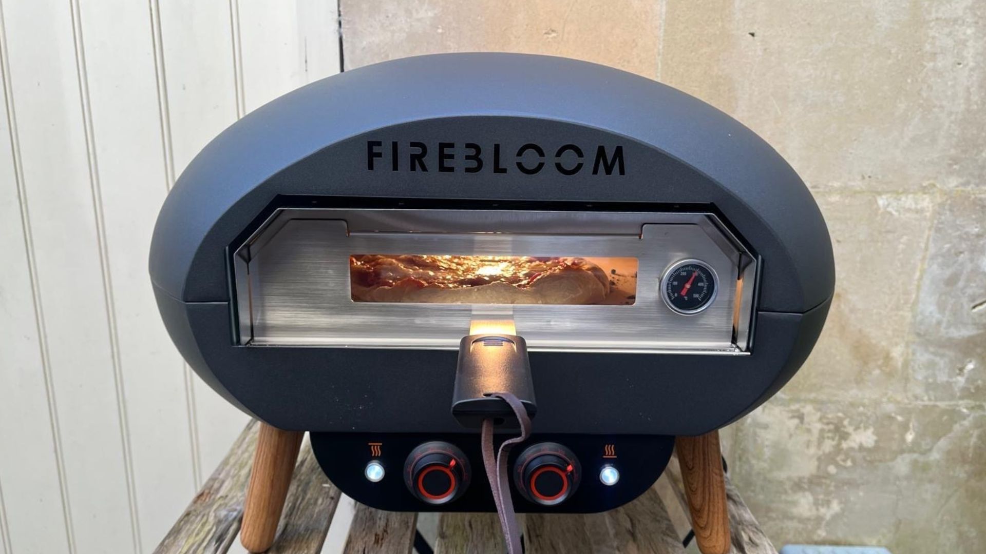 The Firebloom EP03 Electric Pizza Oven being tested in a courtyard