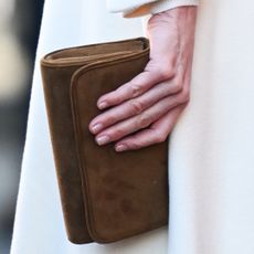 Princess Kate holding a brown bag