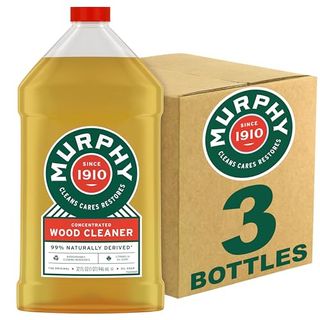 A bottle of Murphy Oil Soap Wood Cleaner with green logo and red lid next to a cardboard box