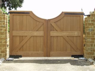 double solid wood garden gate on a drive