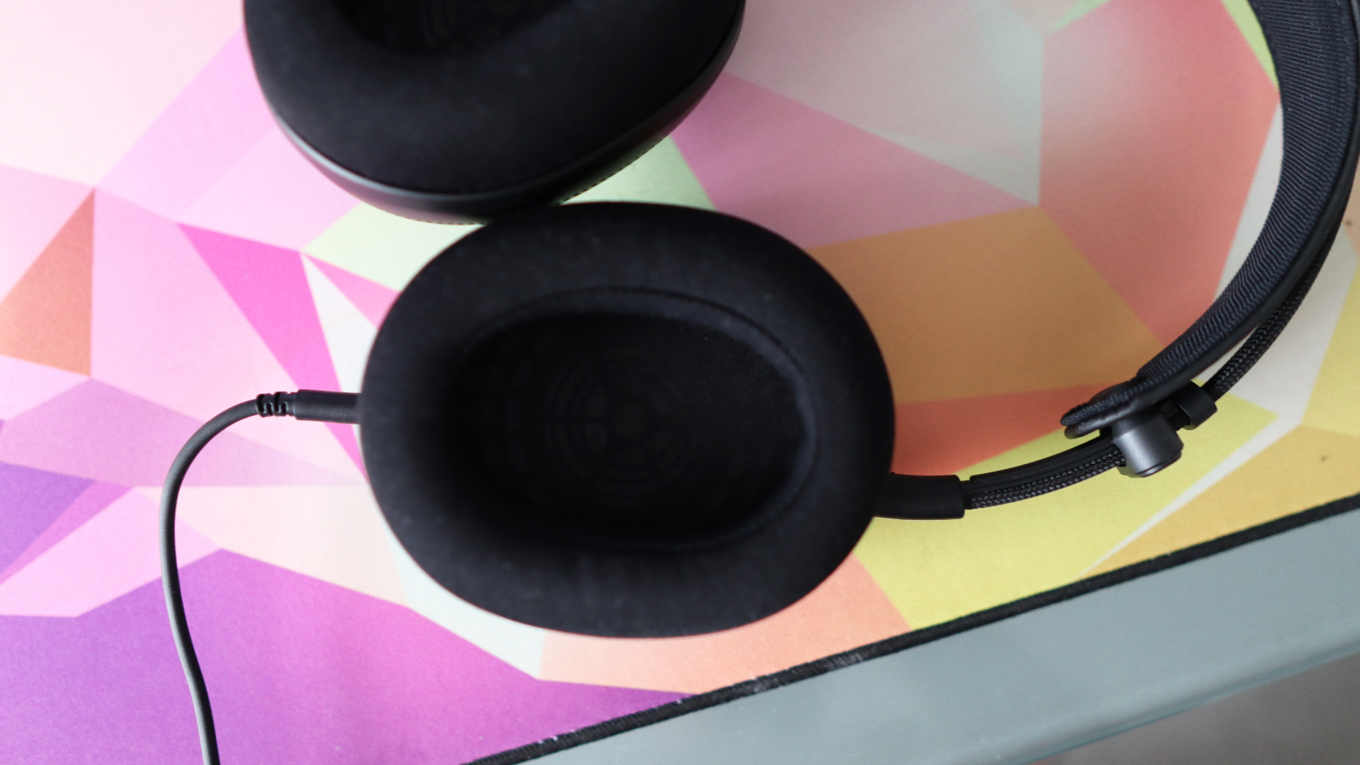 Sony Inzone H6 Air headset on a mouse pad.