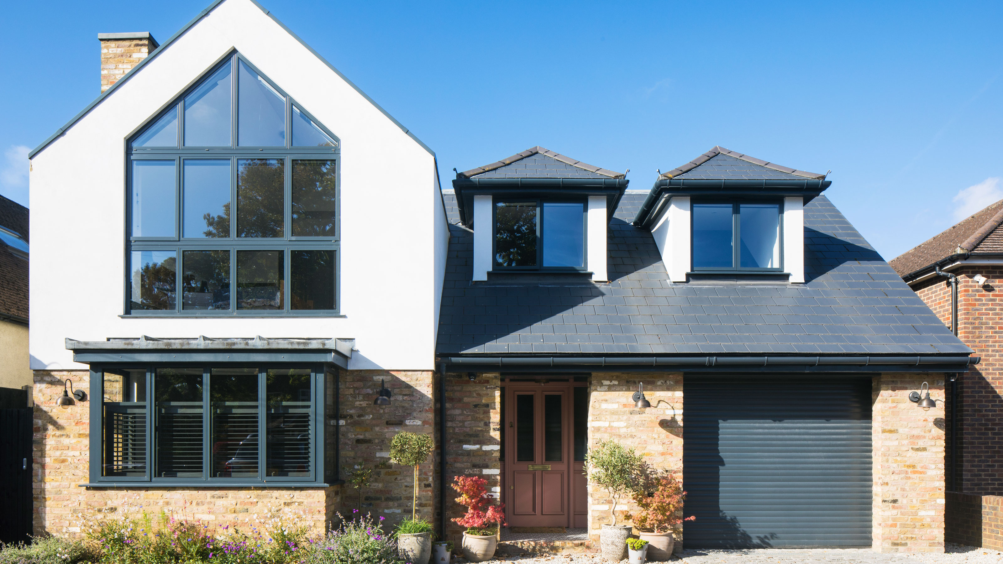 House with white wall and black frames