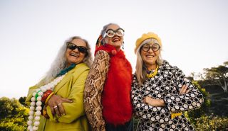 Three women dressed in retro inspired clothes