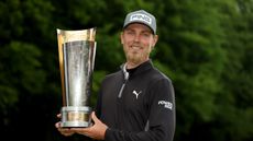 Kristoffer Reitan poses with the 2025 Soudal Open trophy