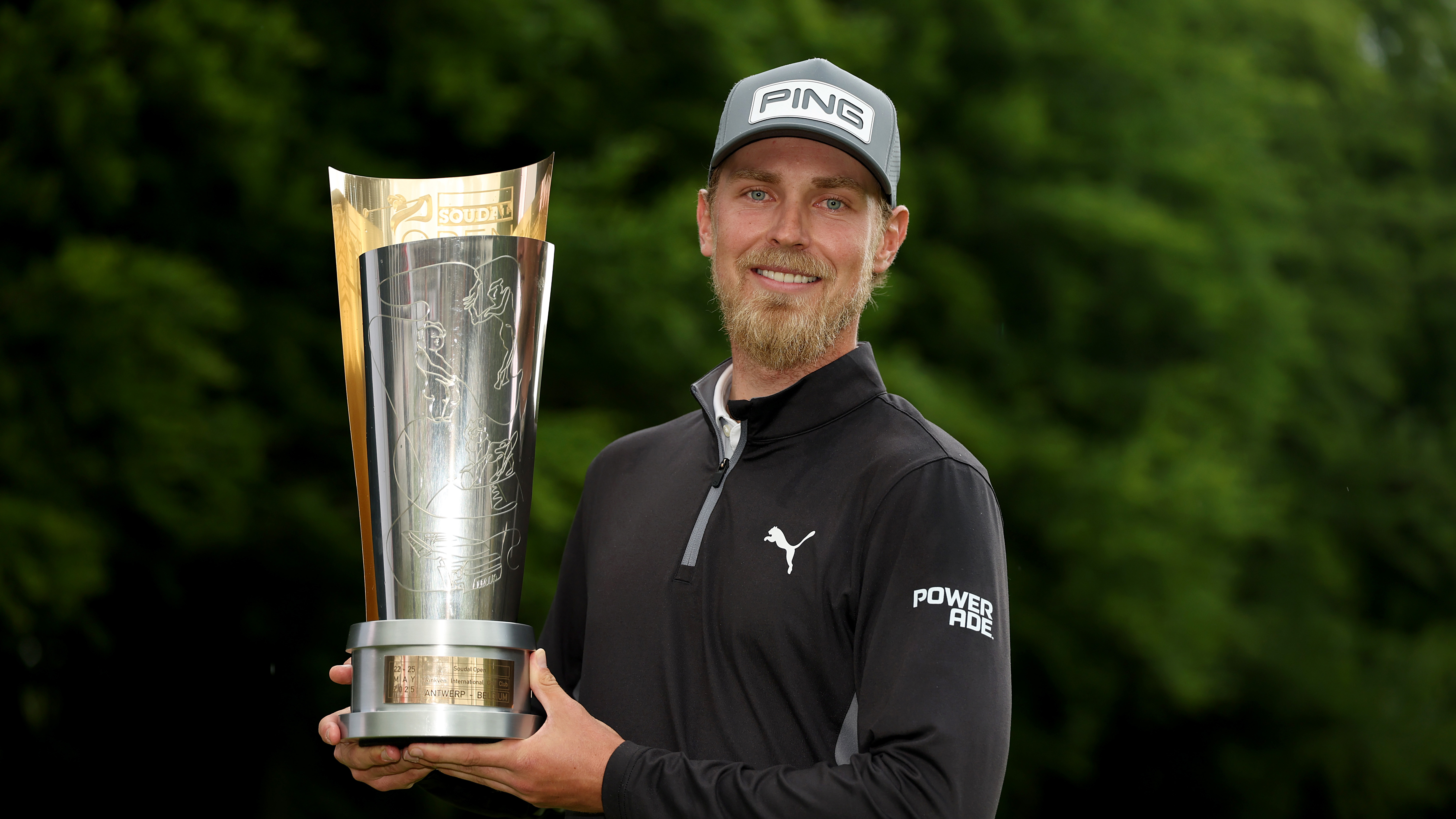 Kristoffer Reitan poses with the 2025 Soudal Open trophy