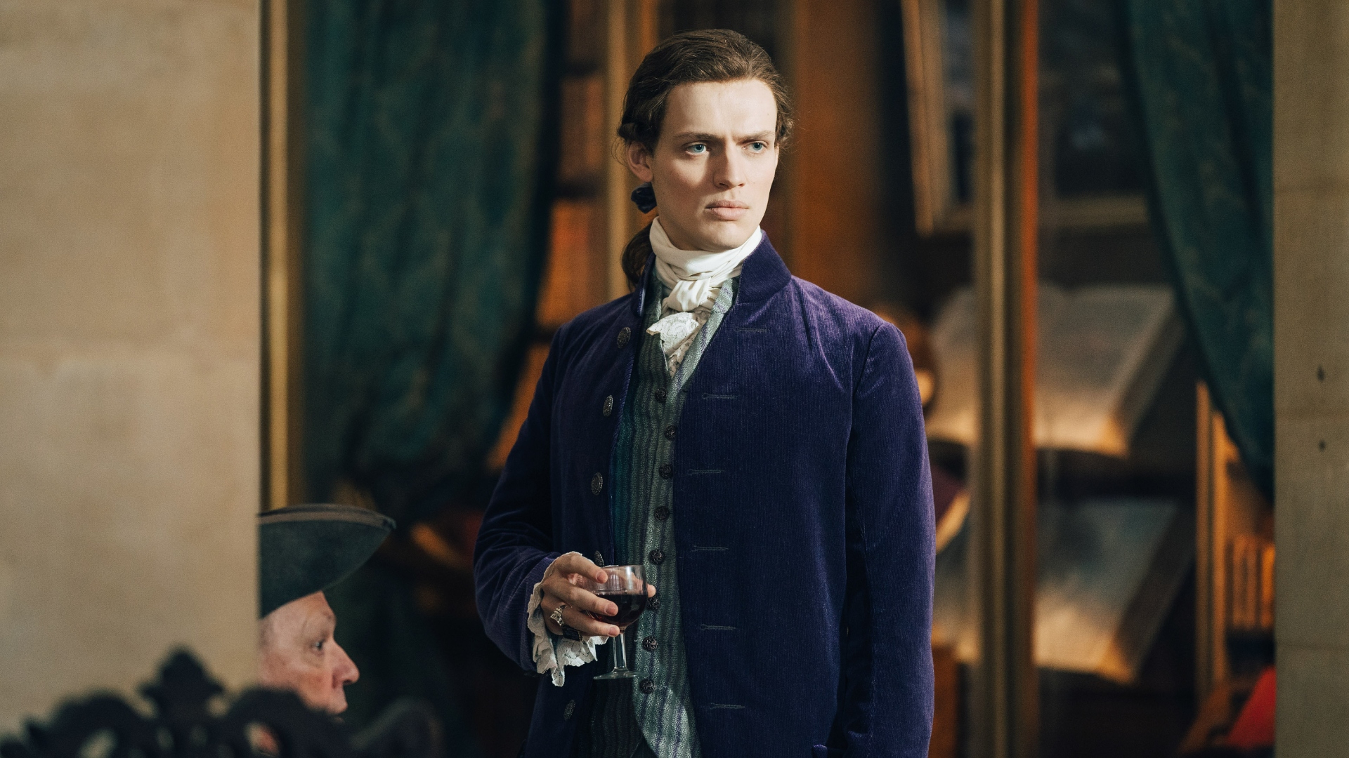 Orleans celebrates with a drink in Marie Antoinette