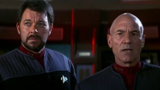 Jonathan Frakes and Patrick Stewart look ahead with concern in Star Trek: First Contact.