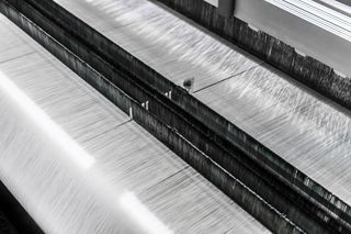 A close up of a denim loom