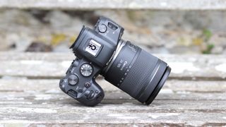 Canon EOS R6 propped up outdoors on stone surface