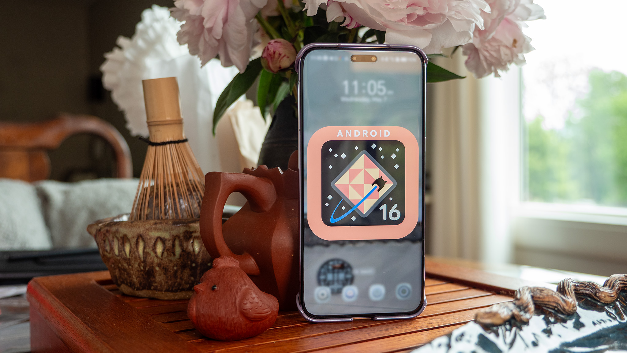 The Honor Magic 7 Pro RSR edition with the Android 16 logo on the display