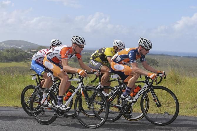 Jack Haig climbs alongside Jai Crawford