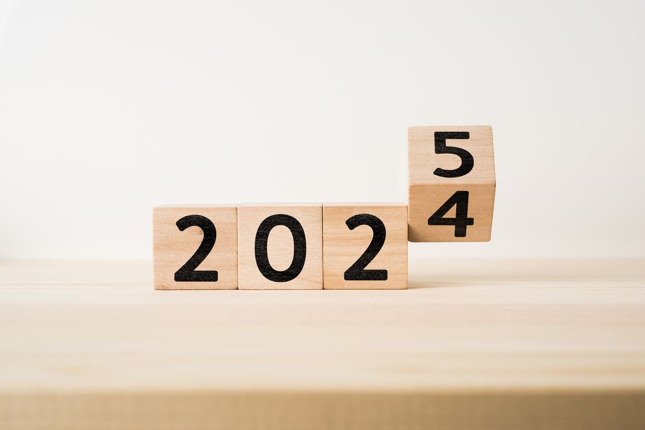 wooden blocks signaling the changing from calendar year 2024 to 2025