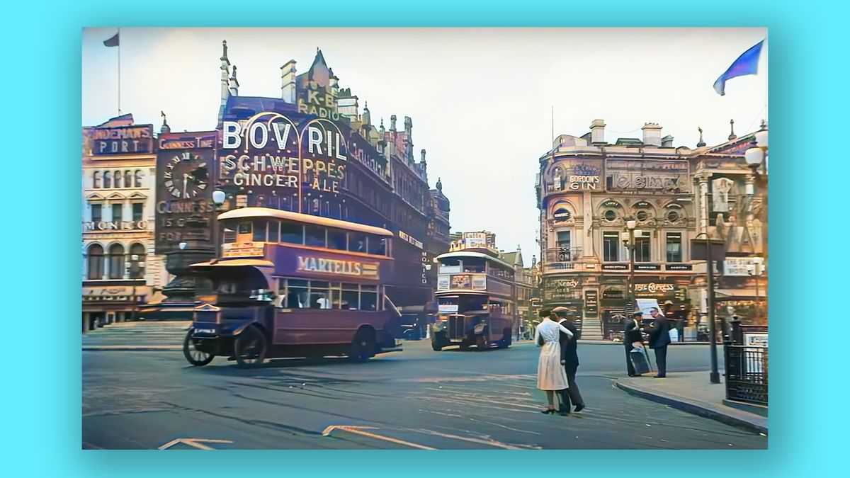 A screenshot of a video showing a London street in the 1930s in AI-enhanced colour