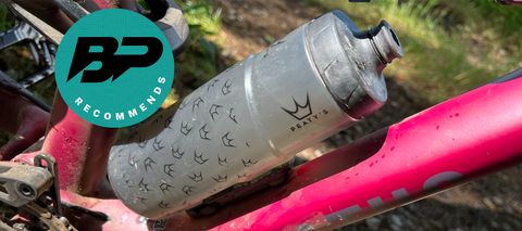 A water bottle fitted to a bike with the Bike Perfect recommends badge