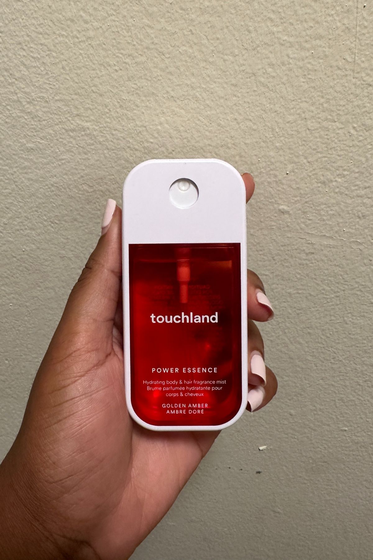 Ariel Baker testing Touchland Amber Mist