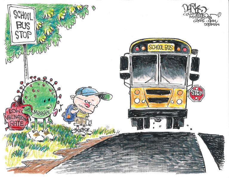 A young boy with a backpack waits for the school bus in this cartoon. He looks to his right, where a measles germ whistles while it also waits for the bus. The measles has a backpack labeled "low vaccination rate."