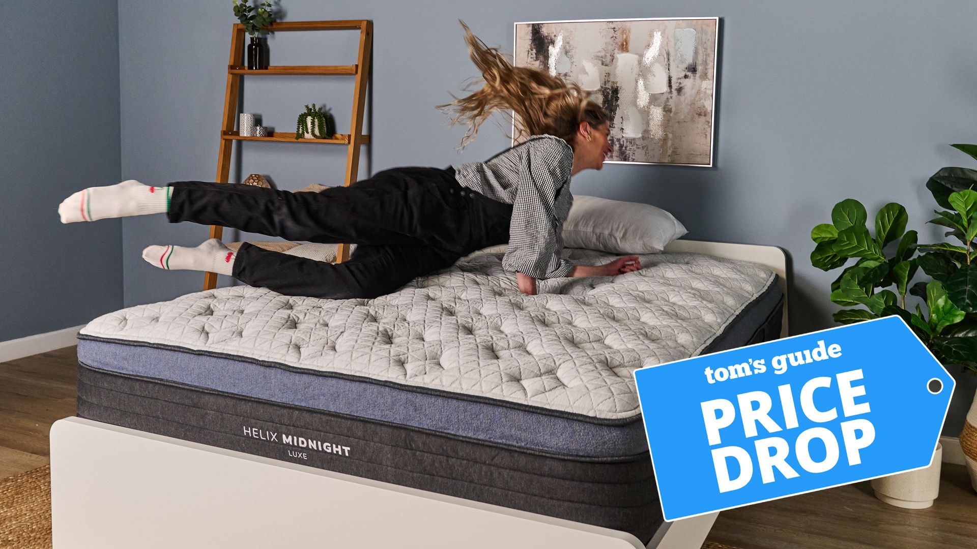 The Tom&#039;s Guide Sleep Editor jumping on a Helix mattress 