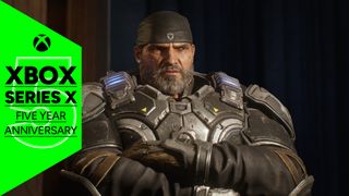 A soldier standing in heavy armor with his arms crossed in Gears 5