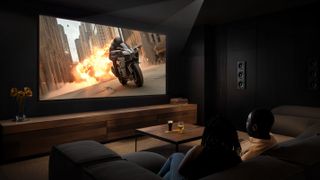 Epson Pro Cinema LS9000 projecting image of motorcycle racer
