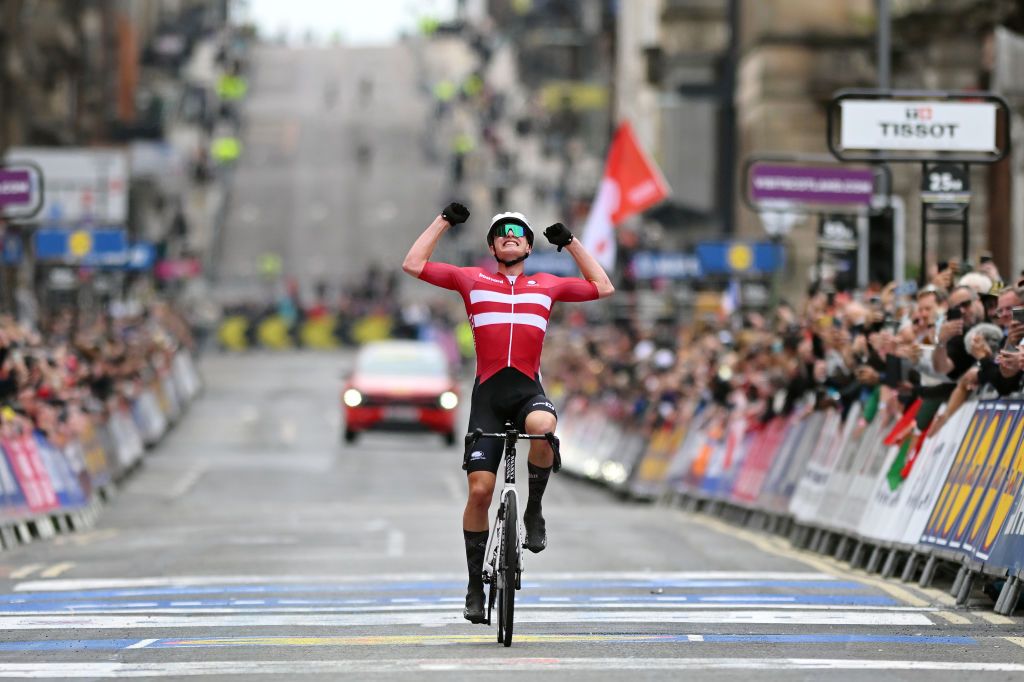 GLASGOW SCOTLAND AUGUST 05 Albert Withen Philipsen of Denmark celebrates at finish line as gold medal winner during the mens junior road race at the 96th UCI Glasgow 2023 Cycling World Championships Day 3 1277km course in Glasgow UCIWWT on August 05 2023 in Glasgow Scotland Photo by Dario BelingheriGetty Images